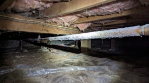 Frozen pipes in a crawl space of a Virginia home